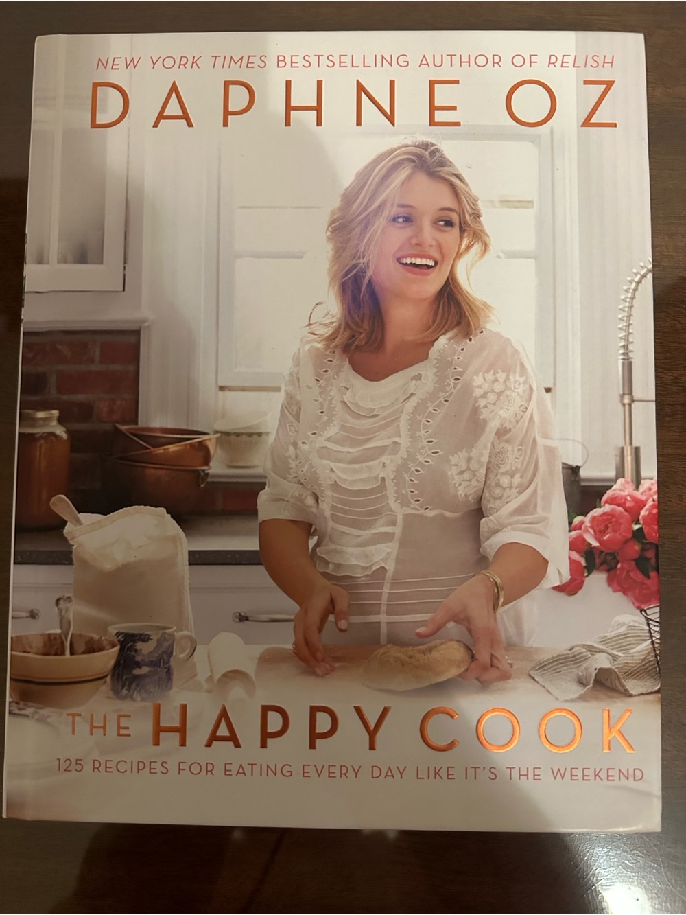 Daphne Oz "The Happy Cook" Cookbook - White Cover with Orange Title